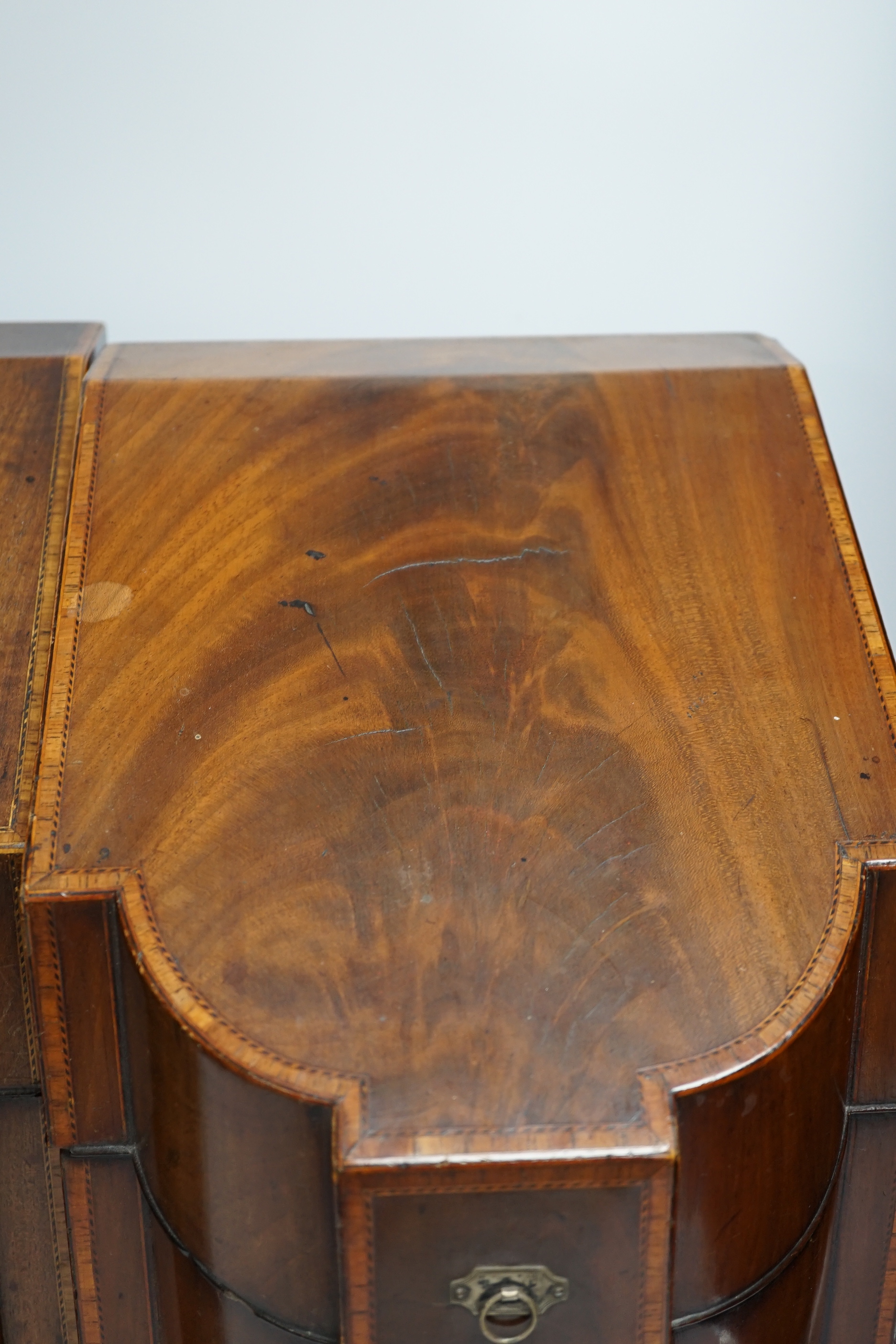 A pair of George III mahogany inlaid knife boxes with shield shaped lock plates (one converted), 38cm high